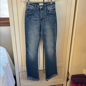 Women's Blue Frayed Hem Jeans- Brand new size 0/23 paid $75. I will start at $40